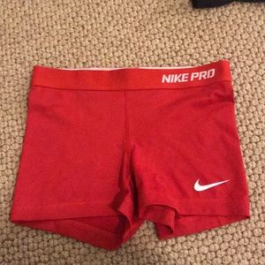 red nike pros